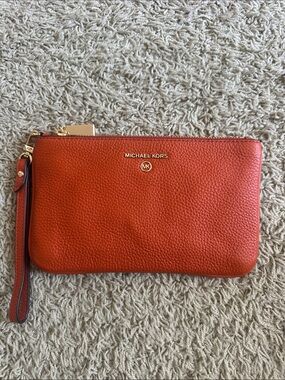 Michael Kors Orange Pebbled Leather Wristlet Clutch with Gold Hardware